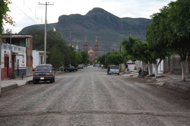 Street view of Margaritas, Jalisco, with Our Lady of the Assumption Church at the end.