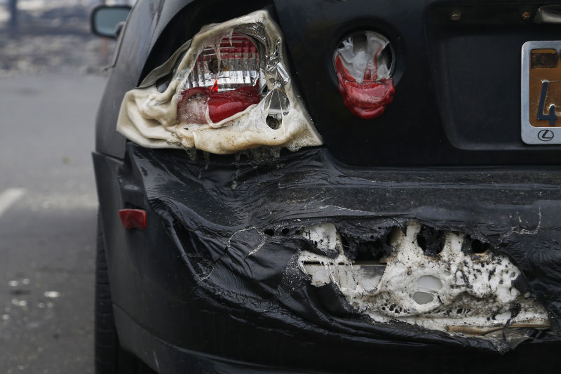 A vehicle damaged by the Valley Fire is seen on September 13, 2015 in Middletown, California. (Photo by Stephen Lam/ Getty Images)