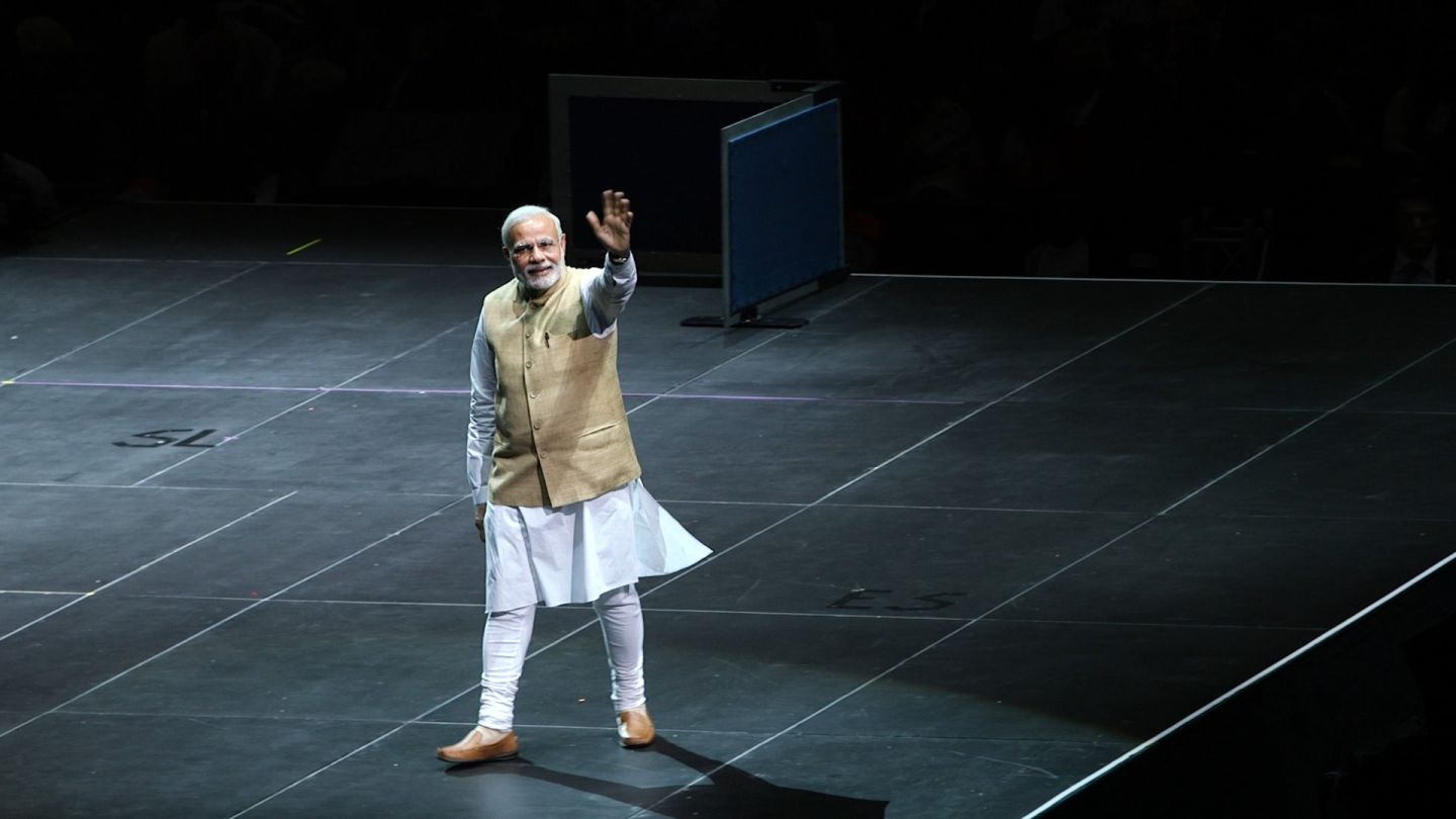 India's Prime Minister Modi walks onto the stage at San Jose's SAP Center