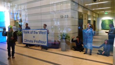 Protesters locked to each other in the Bank of the West lobby