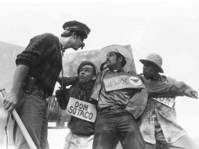 Luis Valdez (center) performs with his "Farmworkers Theatre" on a flatbed truck in the Central Valley in 1967.