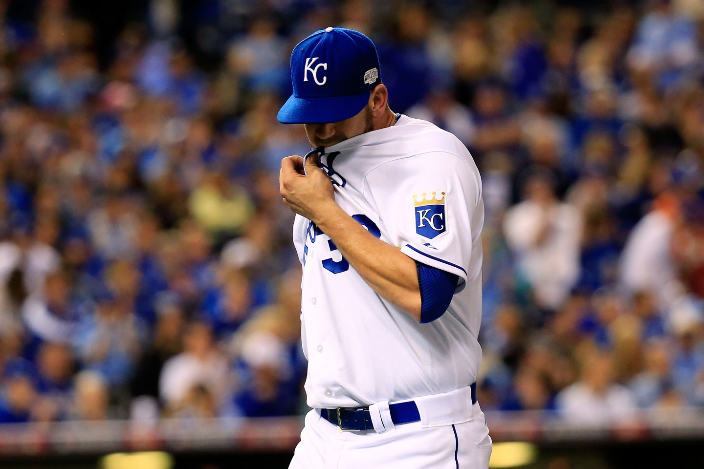 Royals starter James Shields is pulled after allowing the first three Giants to reach base in the top of the fourth -- the final blow being Morse's single to make the score 4-0. Shields was eventually charged with five earned runs on seven hits in just three complete innings.   (Rob Carr/Getty Images)