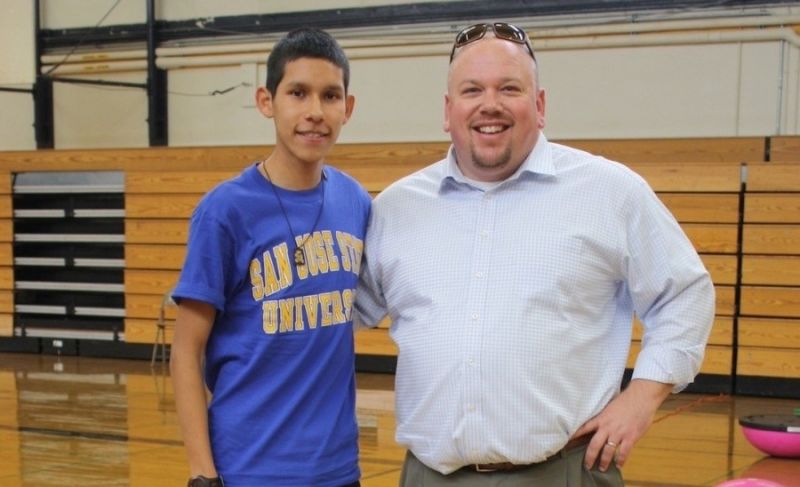 Abraham Lincoln High School Principal Matthew Hewitson (right) says Lincoln High students have completed hundreds of projects over the course of three years. 