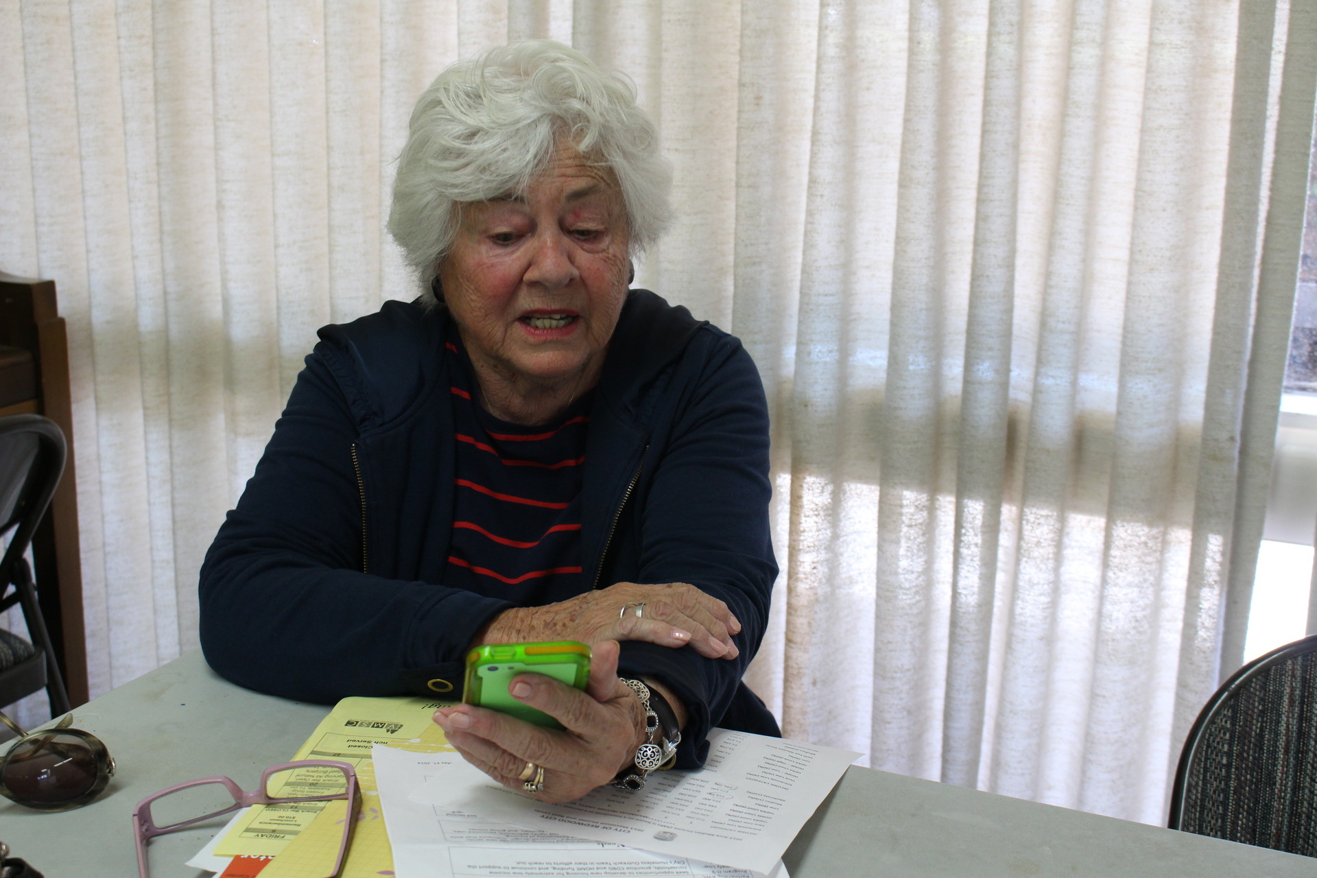 Barbara Britschgi, 80, prepares for a senior affairs commission meeting in Redwood City, her lifelong hometown. She says skyrocketing rents and housing prices are diminishing Redwood City's diversity, as well as resident's quality of life.