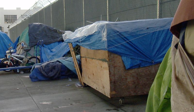 Hoyt Walker's box is part of a larger homeless camp on 13th Street.