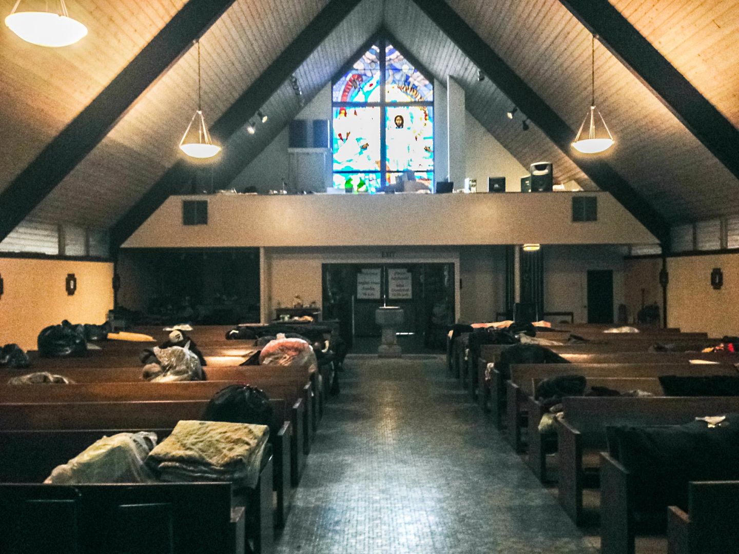 About 30 people sought shelter from wet winter storms last week inside the sanctuary at All Souls Episcopal Church in L.A.’s Highland Park neighborhood.