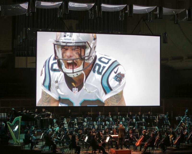 For "Super Bowl 50: Concert of Champions," the San Francisco Symphony played a night of football music, set to clips from football films. 