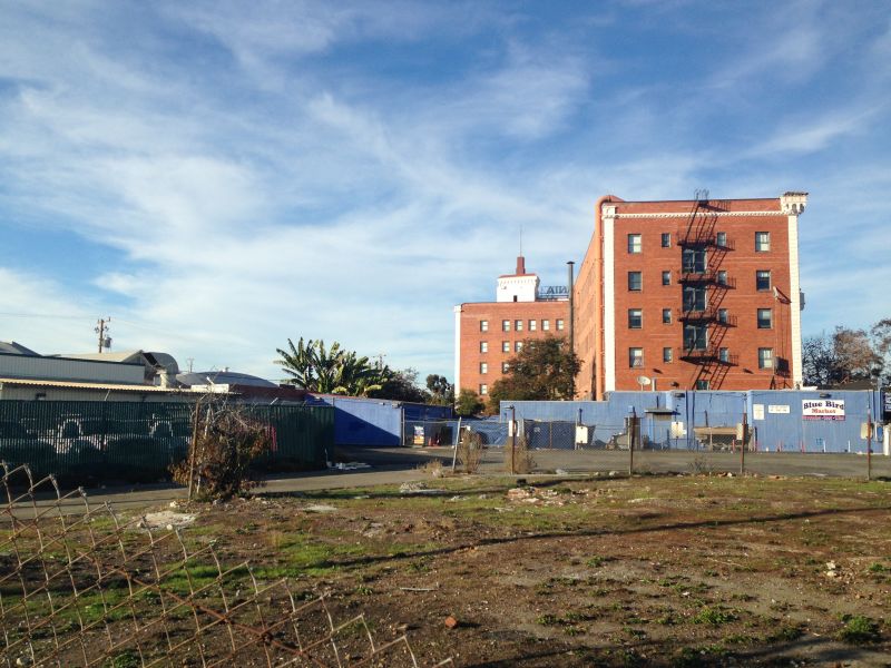 East Bay Asian Local Development Corporation bought the lot adjacent to the hotel and will build more affordable housing on the site.