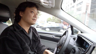 John Han has been a cab driver in San Francisco for 13 years. (Adam Grossberg/KQED)