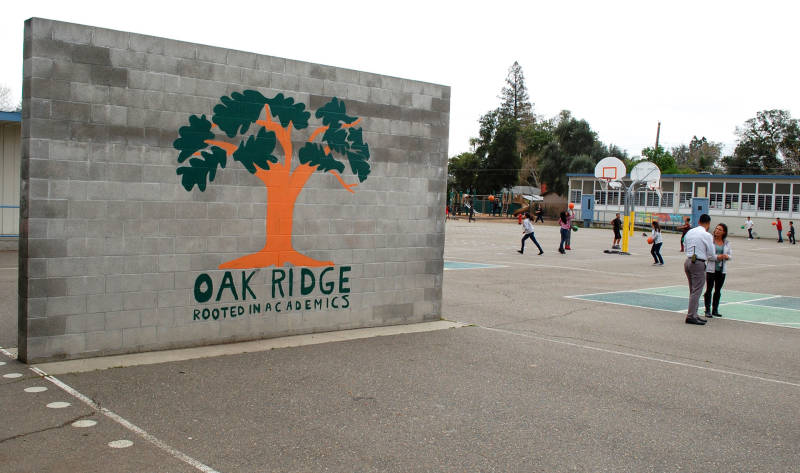 A handball court is decorated with school pride at Oak Ridge Elementary, one of seven "priority schools" in the Sacramento Unified School District.