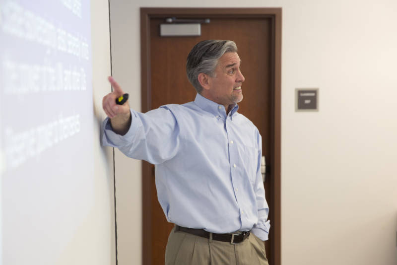 Professor David Andrus, chair of the department of political science at College of the Canyons in Santa Clarita, California, teaches his class to think critically about the elections.