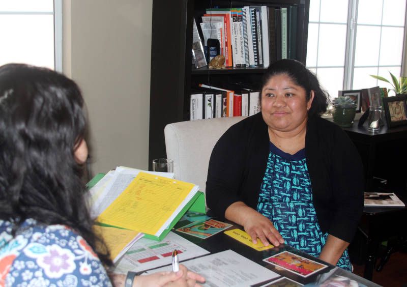 Pablo Aguilar's mother Evelyn meets with Mercedes Castillo, an immigration lawyer in East Los Angeles on Feb. 8, 2016.