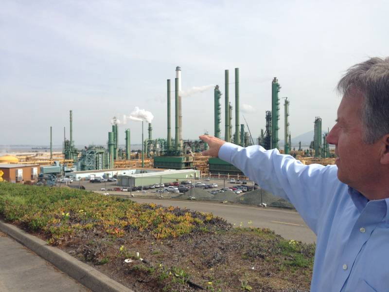 Chris Howe, safety director for Valero's Benicia refinery, points to where trains would come to deliver crude oil during a tour on March 2, 2016.