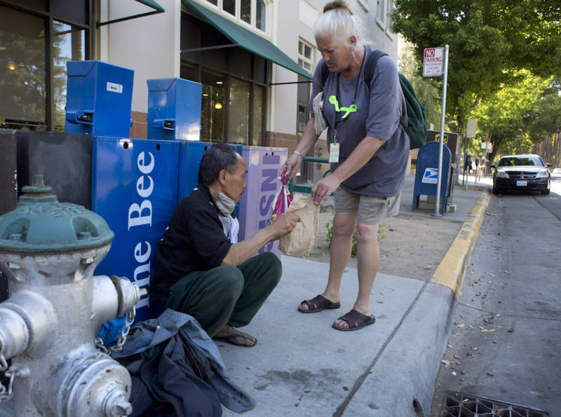Debbie Bartley helps homeless people around the state Capitol. 