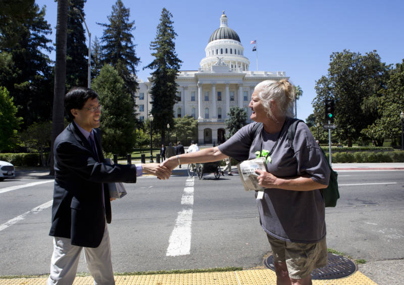 State Sen. Richard Pan (D-Sacramento) shakes hands with Debbie Bartley. 