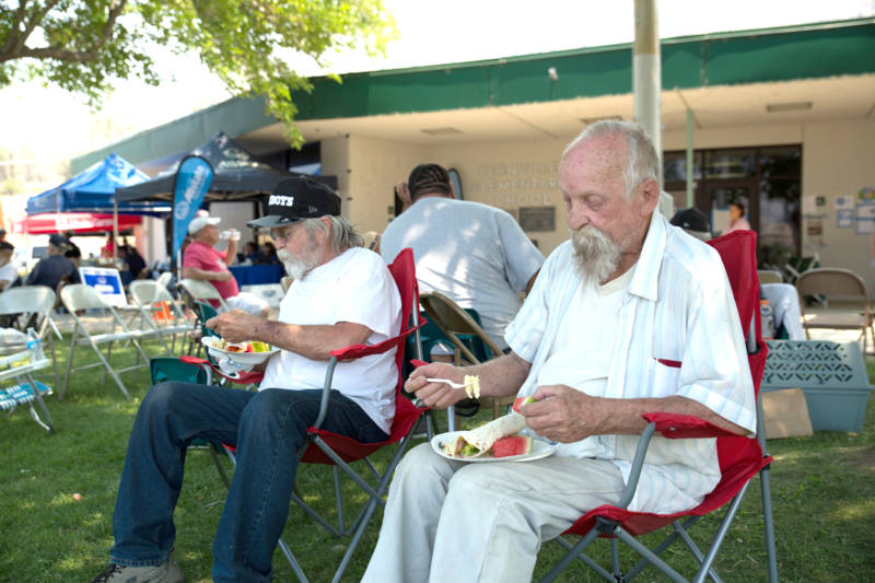 John Null, my uncle, and Robert Moran eat lunch on June 26 at the evacuation shelter in Kernville, Calif. They lived across the street from each other in South Lake. Both lost their homes to the Erskine Fire. 