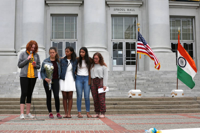 Dana Alpert (left), Hannah Rowe, Aaliyah Parker, Savreen Saran, and Mackenzie Monroe who are all floormates of Tarishi Jain spoke during a vigil for the 19-year-old UC Berkeley which was held on UC Berkeley's campus in Berkeley, Calif. on July 5, 2016. Jain was one of the victims of an attack at a Dhaka cafe in Bangladesh on July 2, 2016.