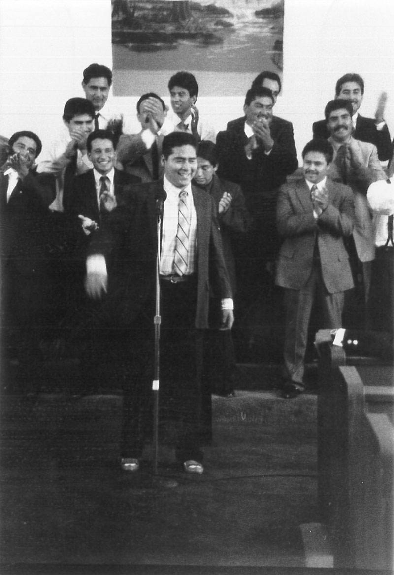 Ruben Nunez sings at a church in National City in 1990.