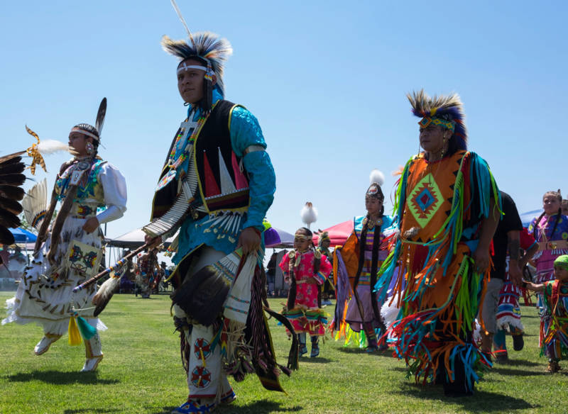 The Sierra Mono Museum's 45th annual powwow started with a procession around the dance circle  on Aug. 6. 