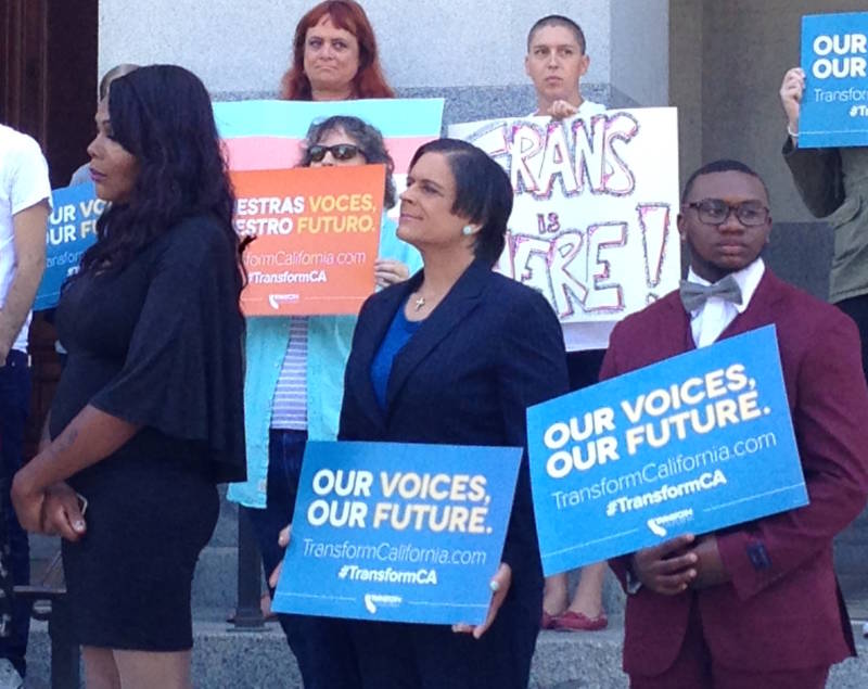 Leon Burse and other transgender advocates participate in a Transform California event outside the state Capitol.