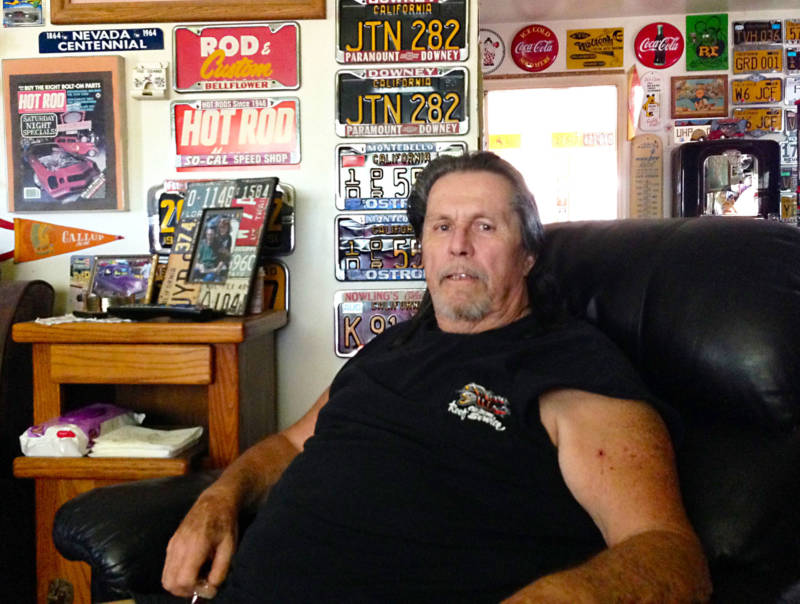 Dave Ellis, Summit Inn regular for almost 20 years, at home with his massive automotive memorabilia collection.