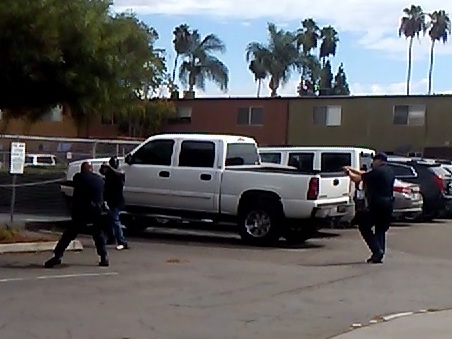 Police in El Cajon, Calif., provided this image, which they say is a still from a bystander's cellphone video of the shooting of Alfred Olango on Tuesday. Police say the man was pointing an object — which turned out not to be a weapon — at an officer.