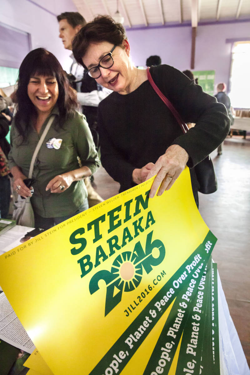 Kate Tanaka speaks with a campaigner at the Jill Stein campaign event in Oakland on October 6, 2016.