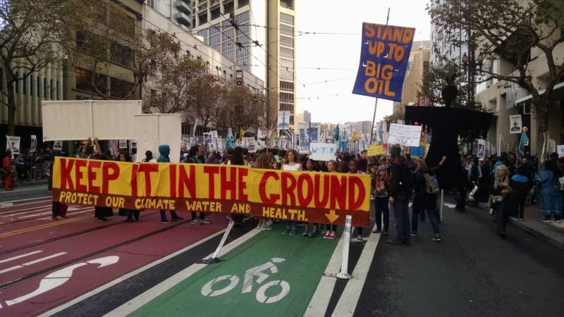 A protest over the Dakota Access Pipeline marches down Market Street in San Francisco.