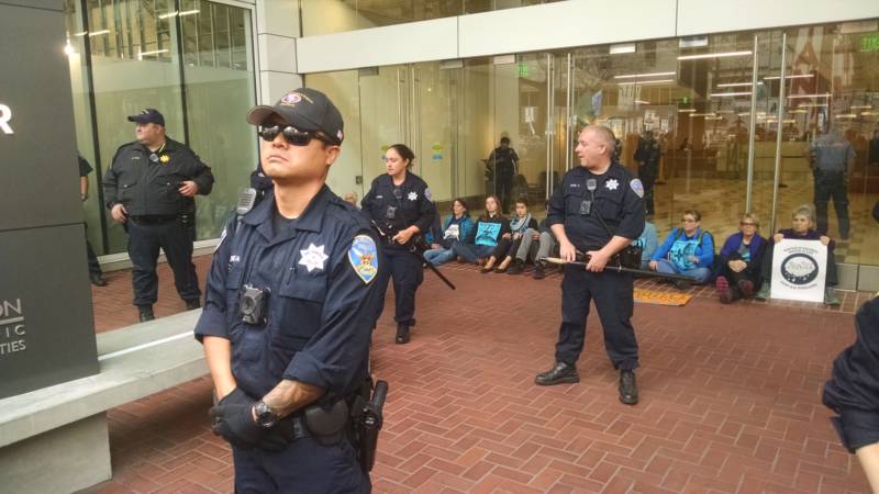 Protesters met at City Hall before marching down Market Street and stopping in front of the U.S Army Corps of Engineers offices.