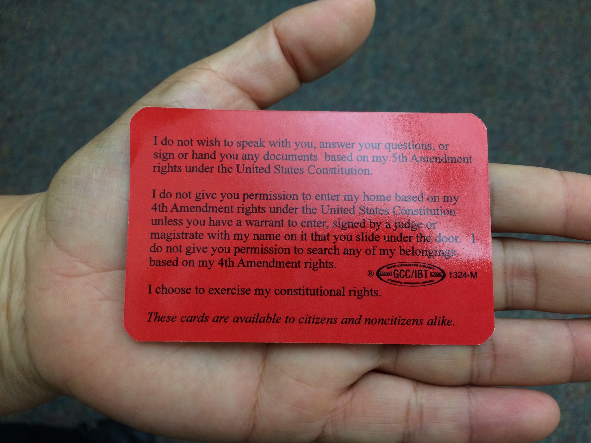 Laura Fierro holds a card listing her right to not open her door for an immigration agent without a warrant, on November 22, 2016. The card was distributed for free by the Immigrant Legal Resource Center at a forum in Longfellow Middle School in Berkeley.