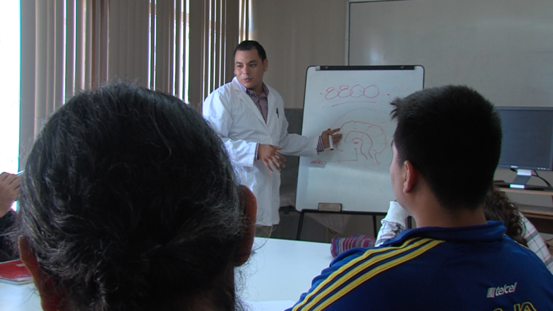 Patients at Tijuana's Centro de Integración Juveníl learn about drug-induced brain damage.