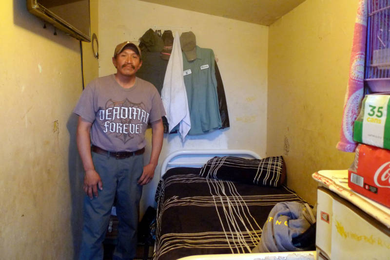 Tafoya family friend Ricardo rents a closet-sized room in their East Salinas apartment.
