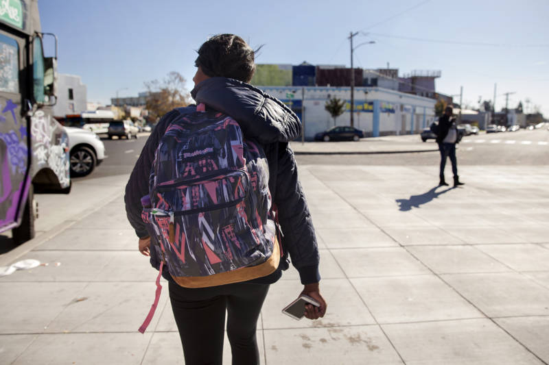 Brittany Jones, a student at Laney College, makes her way from class to her storage unit in West Oakland. Jones is currently homeless and spends up to three hours a day at her storage unit organizing her belongings, doing homework, or relaxing. 
