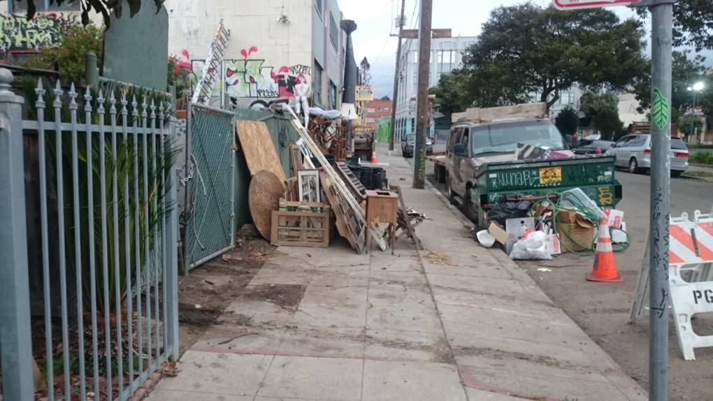 A photograph of trash and debris outside 1305 31st Avenue in Oakland, the scene of a fire on Dec. 3, 2016, that killed at least nine people attending a warehouse party there. The photograph is undated, but was included in a building complaint file started on Nov. 14, 2016.