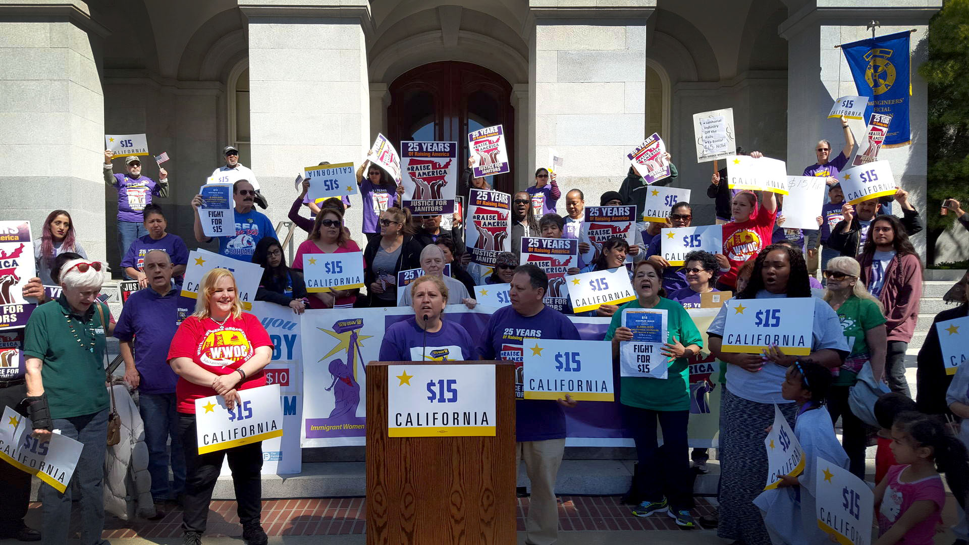 Supporters of a $15 per hour minimum wage rally outside the state Capitol in Sacramento on March 31, 2016.