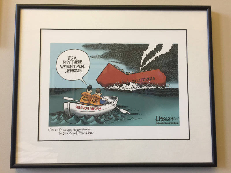 Political cartoon in former Mayor Chuck Reed 's office.