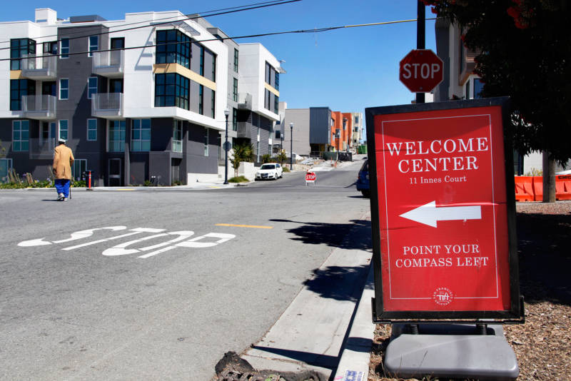 A welcome sign stands outside the new Shipyard housing development at Hunters Point.