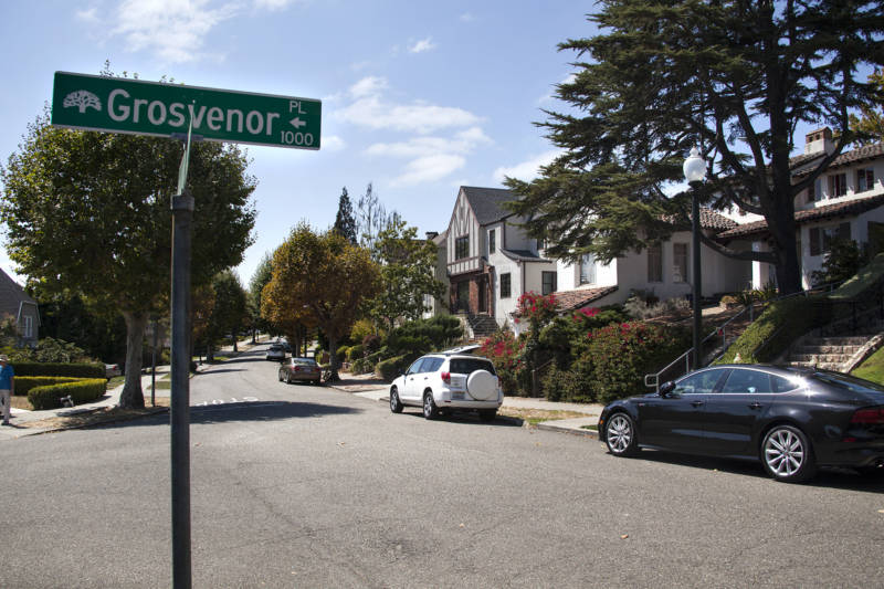 A view of houses along Grosvenor Place in the neighborhood known as Crocker Highlands in Oakland.