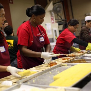 Volunteers prepare meals at St. Anthony's dining hall in the Tenderloin. (Justin Sullivan/Getty Images)