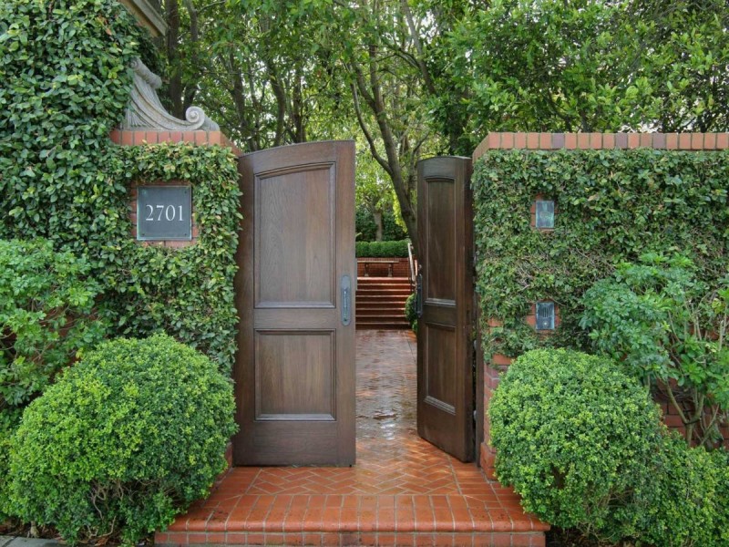 enter-the-home-through-a-door-in-an-ivy-covered-wall