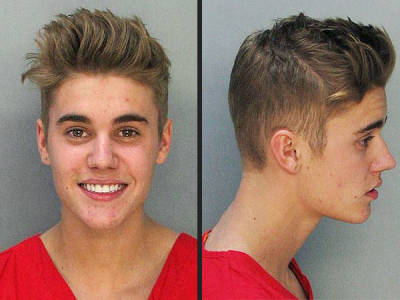 The infamous mug shot: not exactly the face of remorse.