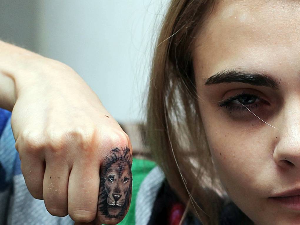 Bang Bang gave Cara Delevingne's this lion tattoo. 