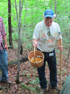 Forest farming instructor Robert Beyfuss displays Chanterelle mushrooms. Credit:  Holden Arboretum.