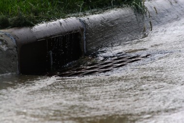 Heavy rains can overload the sewers in some cities and cause raw sewage to enter waterways.  Photo credit: wikimedia