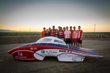 Stanford students stand behind their design Luminos which can reach speeds of 70 mph. Photo: Mark Shwartz