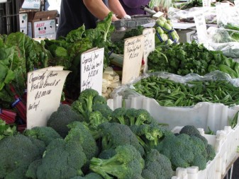 Buying produce at farmers' markets helps support local economies and build community. (Craig Miller/KQED)