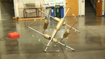 This is the most recent tensegrity robot prototype created by Alice Agogino's lab. The computers and motors that control movement are located in the pods.