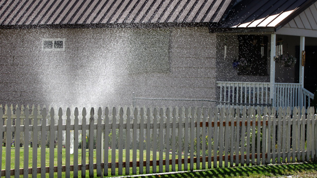 Proposed rules from state water regulators would limit outdoor watering by homeowners. (Craig Miller/KQED)