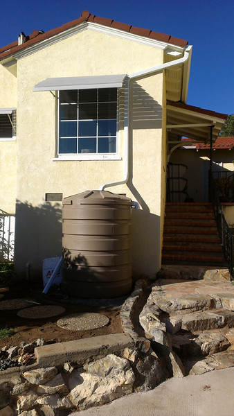 Many Australian homes now have rainwater capture systems. (Albert Barlow, Rain Water Systems)