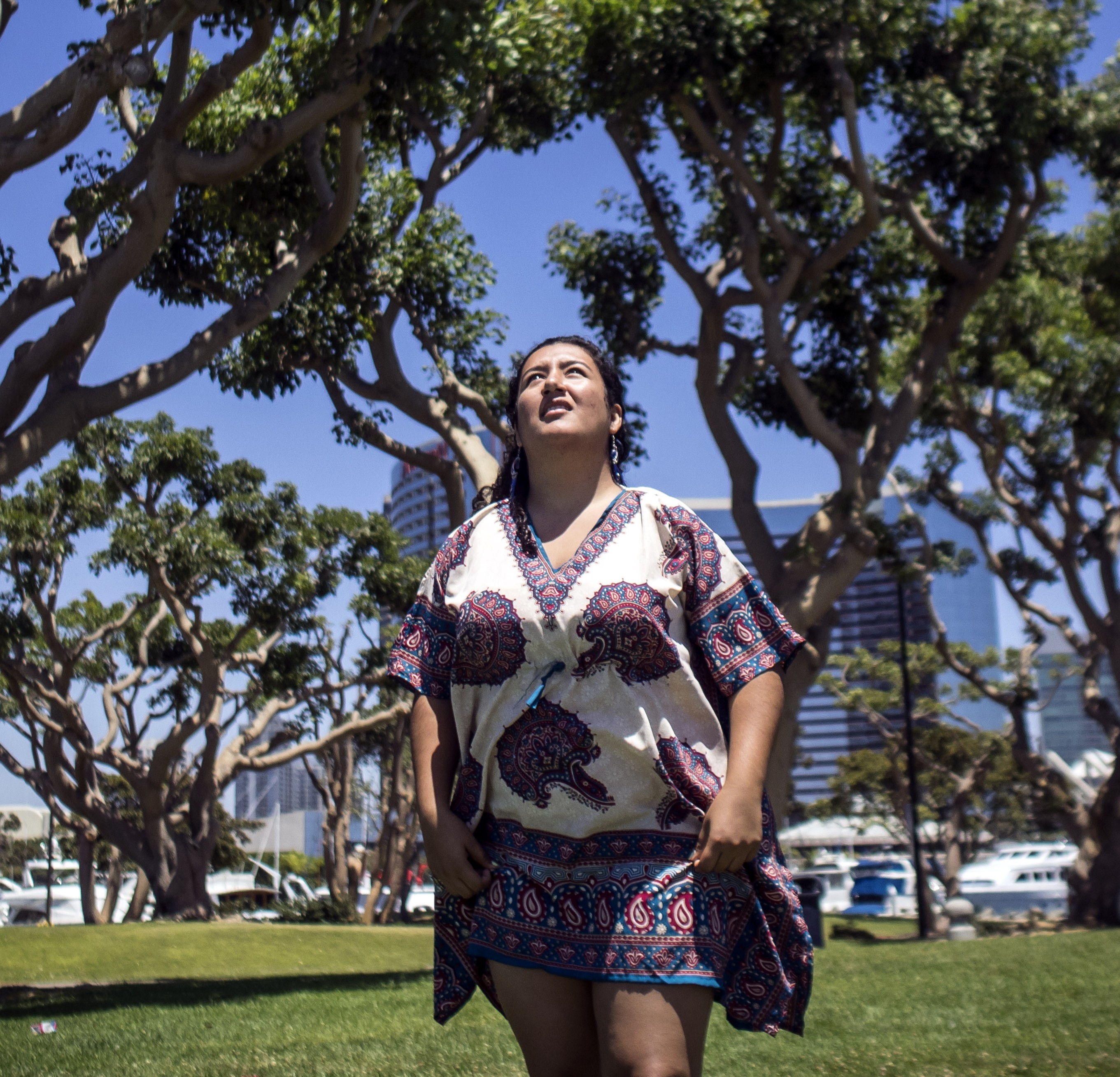 Jasmin heads out to the beach in San Diego on a windy day, to fly a kite. (Marvi Lacar/KQED)